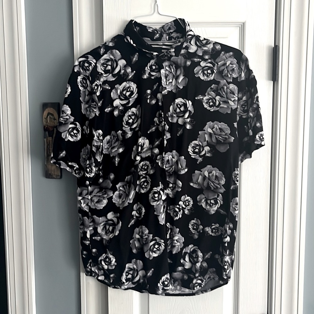 Black floral shirt that I loved wearing, but I gained weight & it’s too tight.